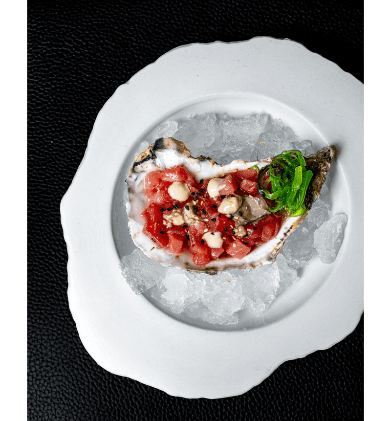 A served oyster, ready to eat.